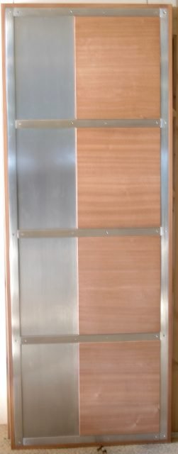 Sapele door with stainless steel metal cladding strips — project 039 by Whitebird Woodcraft